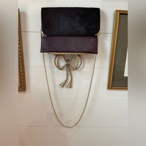 LA DIVA envelope purse with gold tone, chain, and hardware new without tags